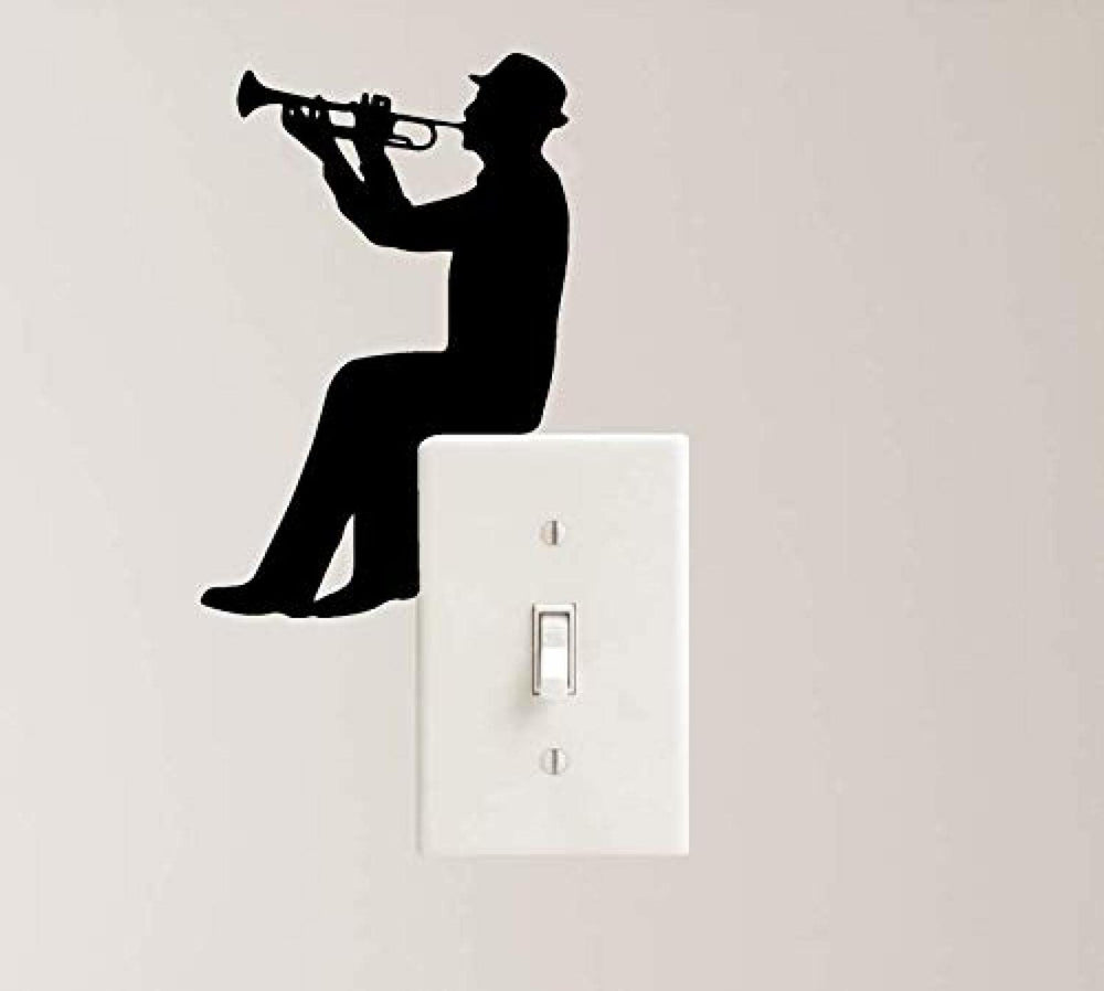 Trumpet music decal on laptop enhances workspace with sleek, removable wall-safe decor