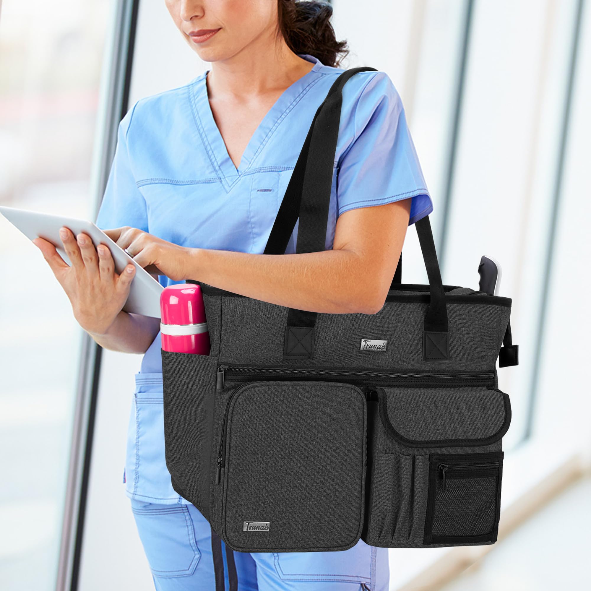 Trunab Nurse Tote Bag side pocket for sanitizer and quick-access supplies.