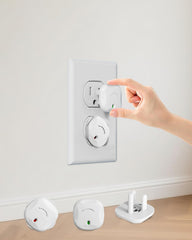 TrusTot outlet covers with rotating unlock design for easy removal by adults.