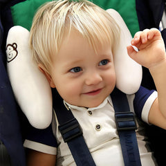 TRYTUTRY pink baby travel pillow head stability prevents side-to-side head flop during rides.