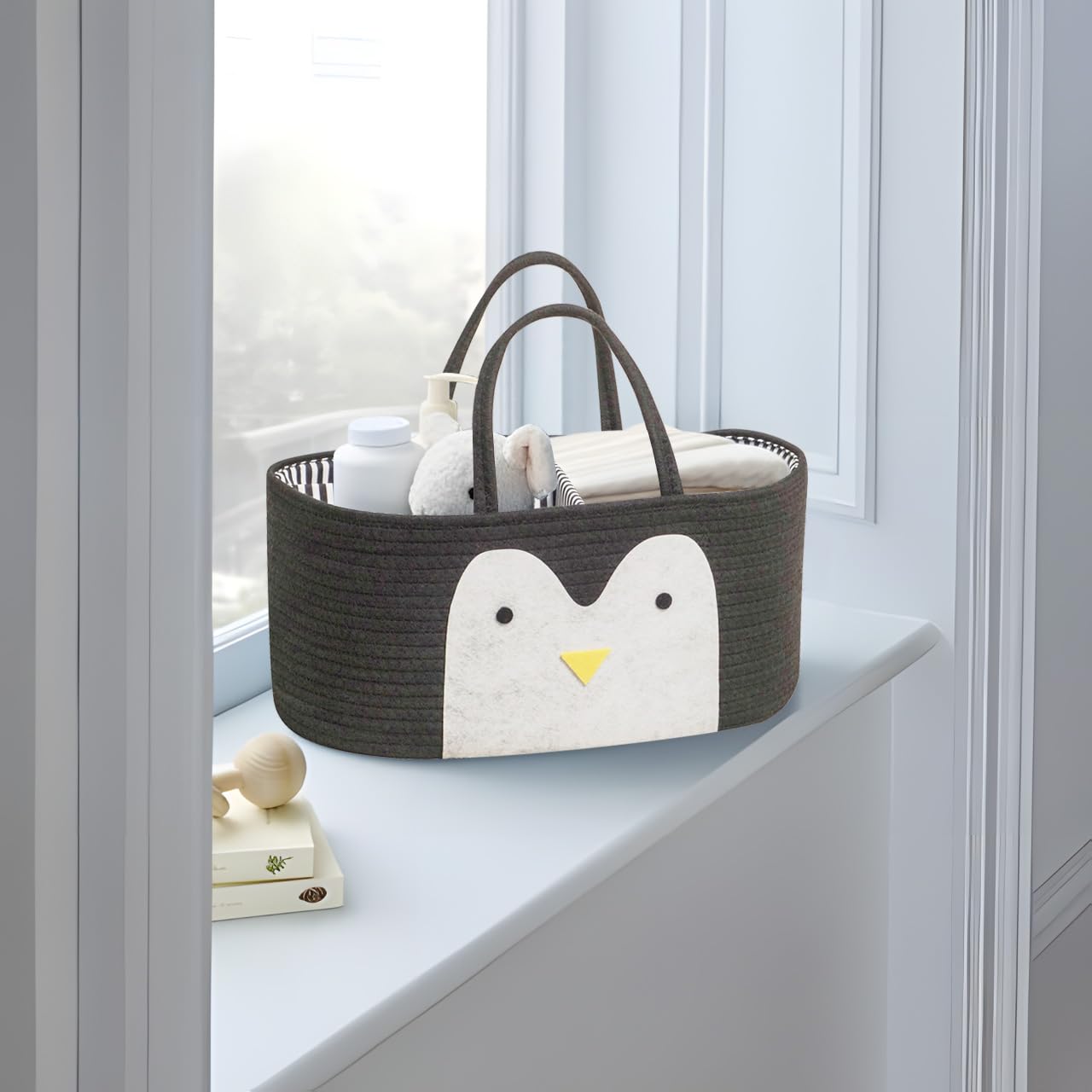 T&amp;T Homewares penguin-pattern diaper caddy with playful storage.