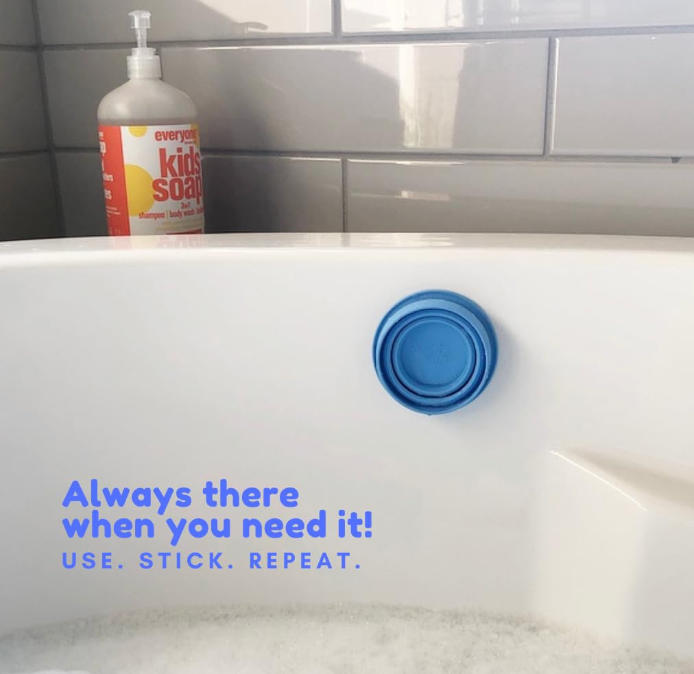 Tubby Cup sticks to tile, glass, porcelain surfaces for organized bath setup.