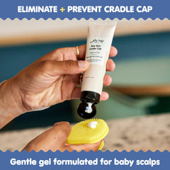 Tubby Todd cradle cap silicone brush for gentle flake removal.