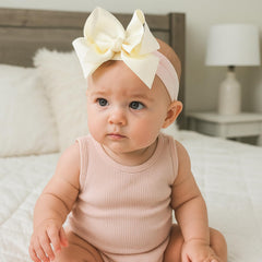 Tucnoeu baby headbands pink closeup showing comfy elastic fit