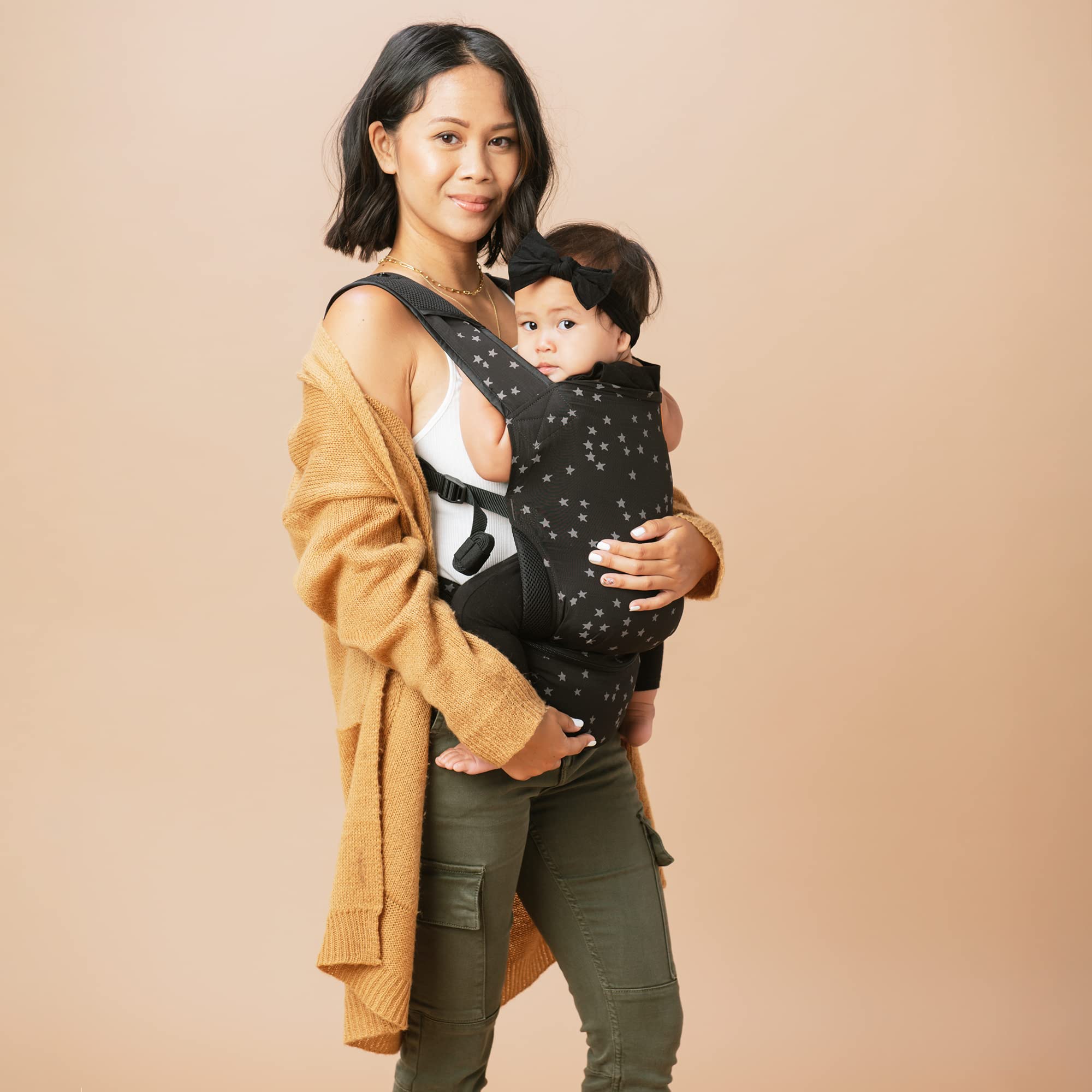 Tula Baby Carrier Lite built-in storage pouch with space for phone and wipes.
