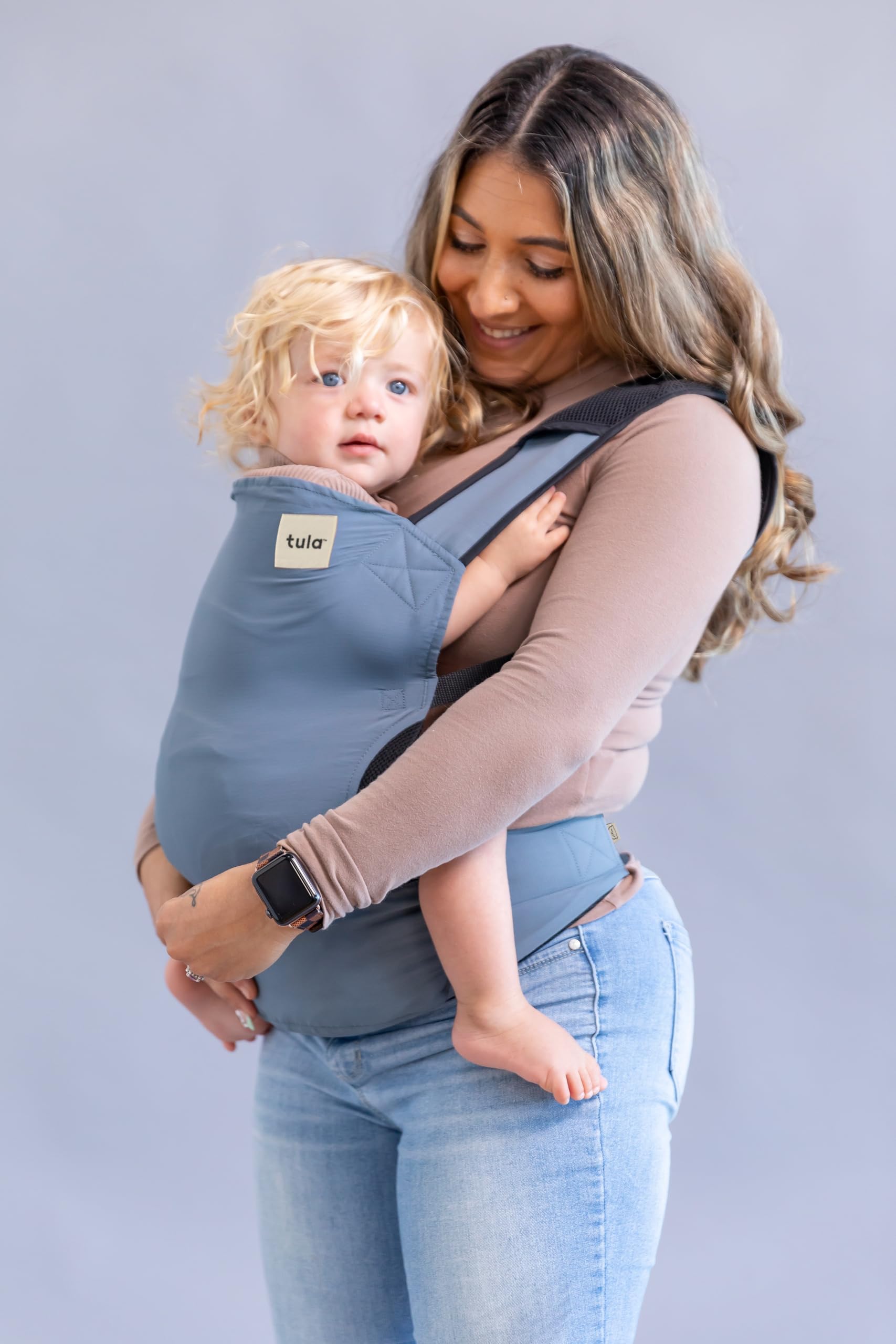 Tula Baby Lite adjustable straps and waistband for a customizable fit.
