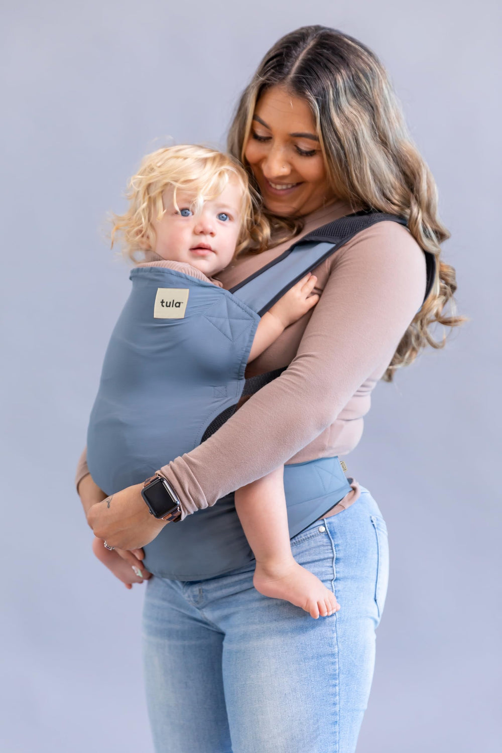 Tula Baby Lite adjustable straps and waistband for a customizable fit.