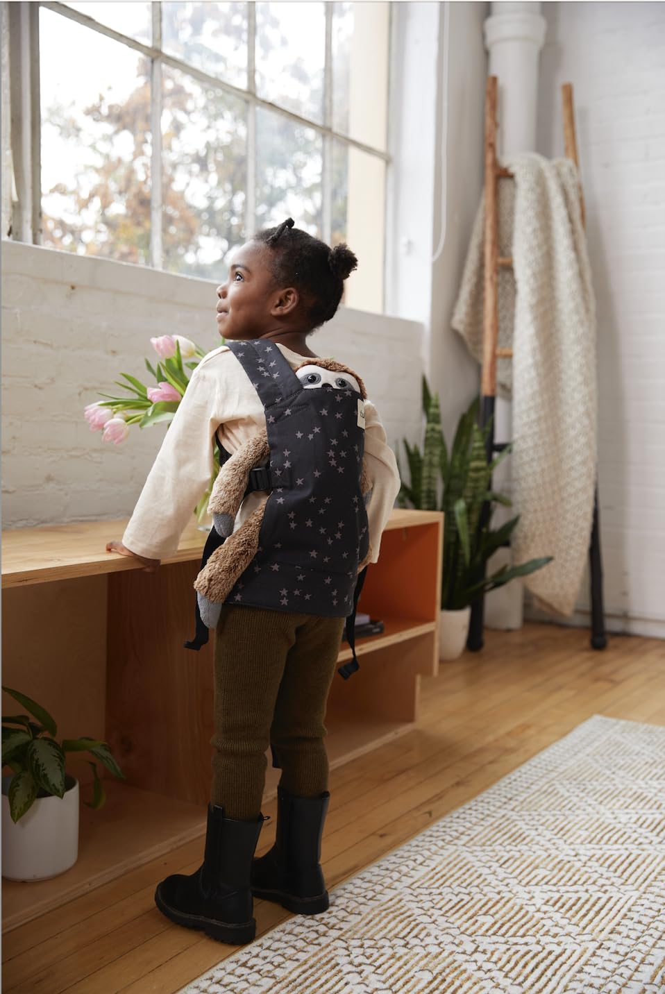 Tula Baby Mini Toy Carrier in soft cotton fabric offers gentle, cozy playtime comfort.