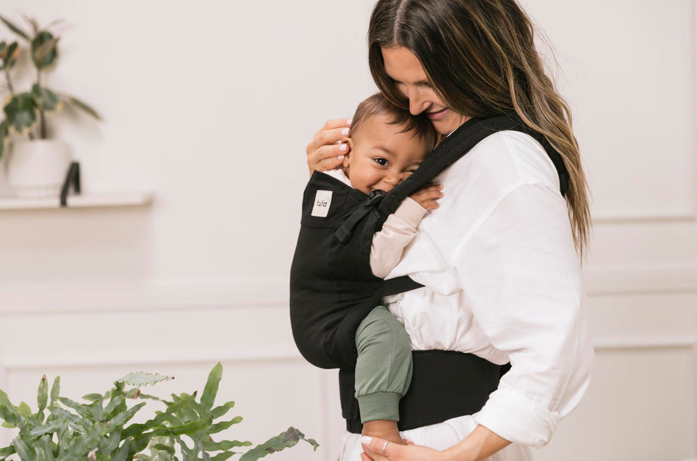 Tula Lite 12-30 lbs range highlights versatile use as your child grows.