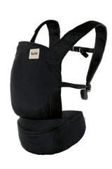 Tula Lite compact carrier packed in waistband for on-the-go storage and quick use.