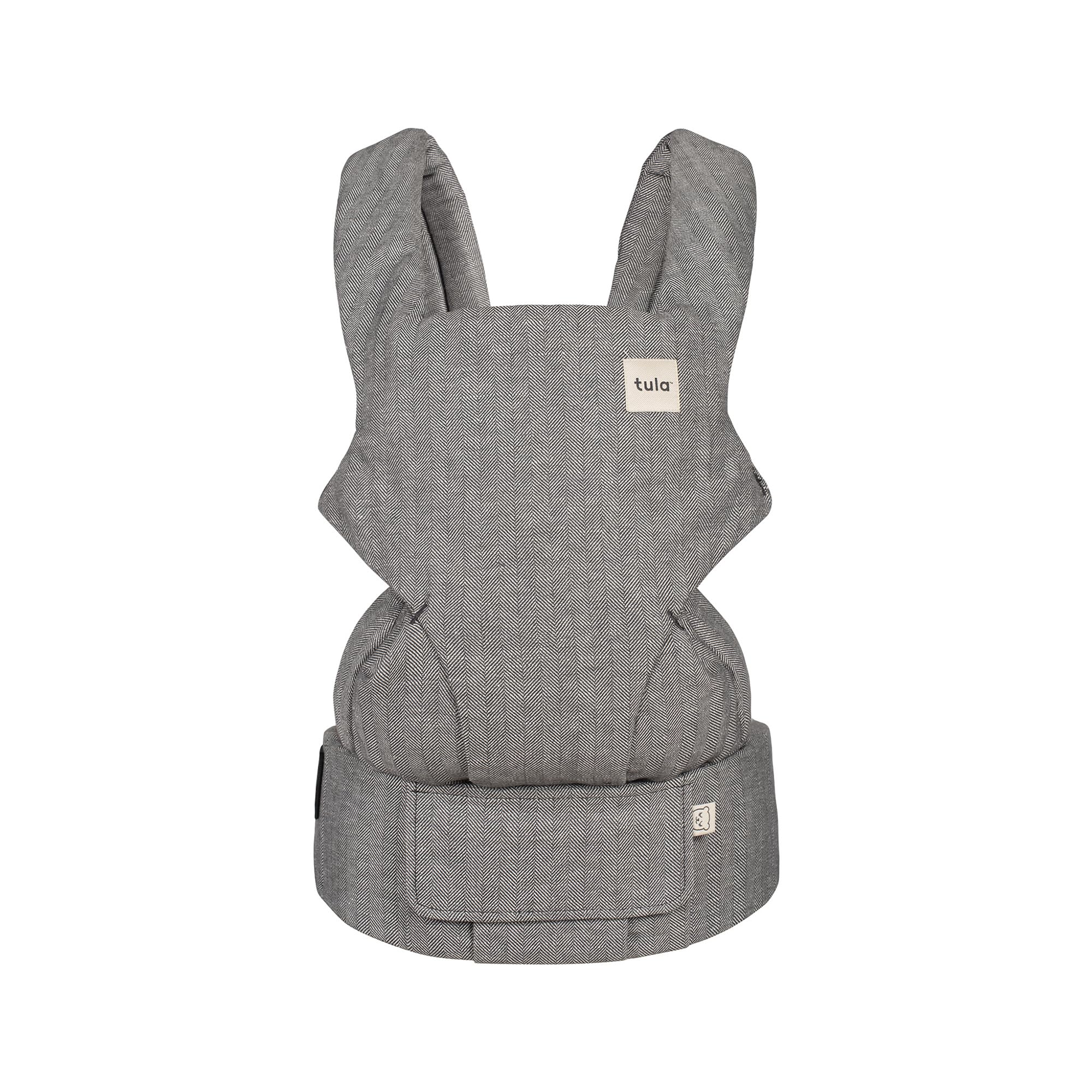 Tula Explore carrier in ash linen for front carry provides ergonomic support on the go.