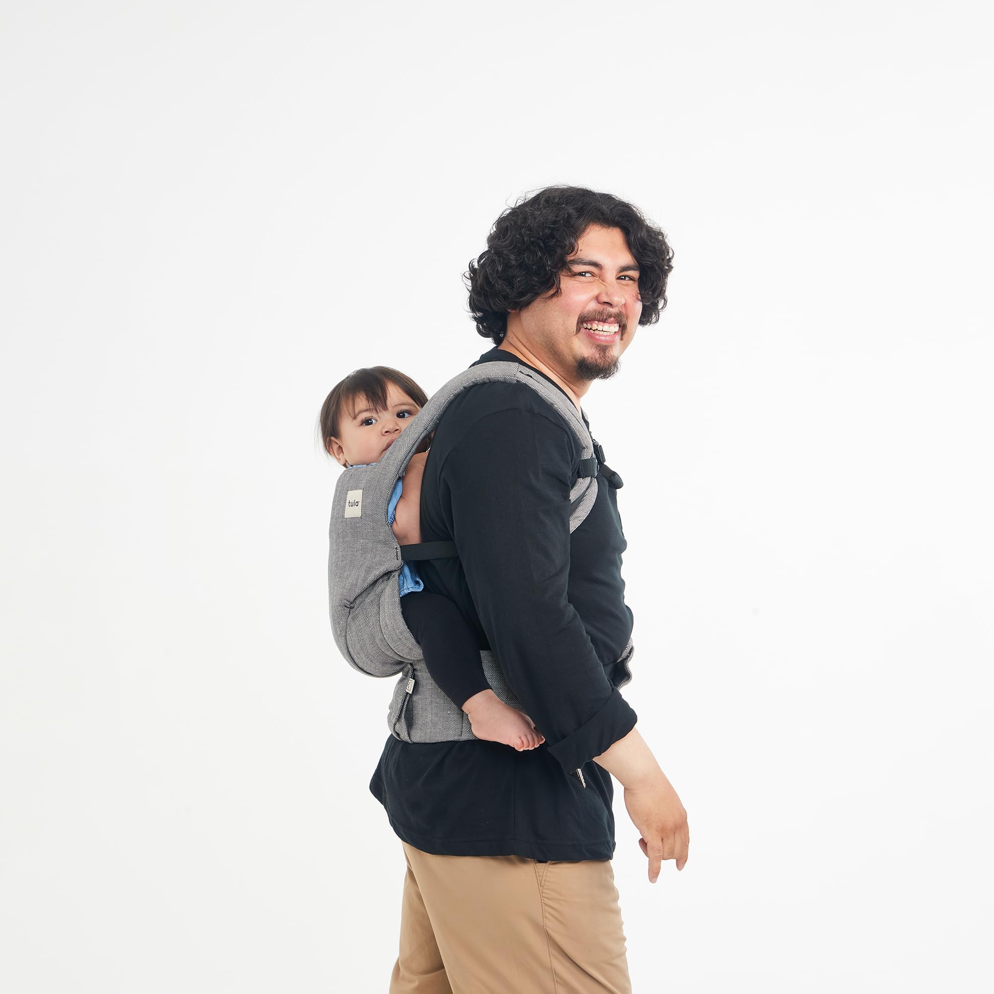 Tula Explore front-facing-in ash linen setup shown for versatile newborn viewing.