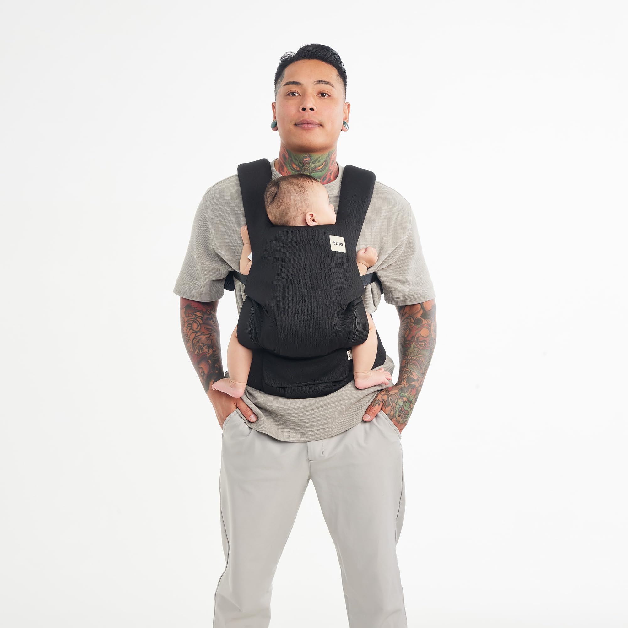 Tula Explore Mesh Urbanista removable hood demonstrates sun protection on the go.