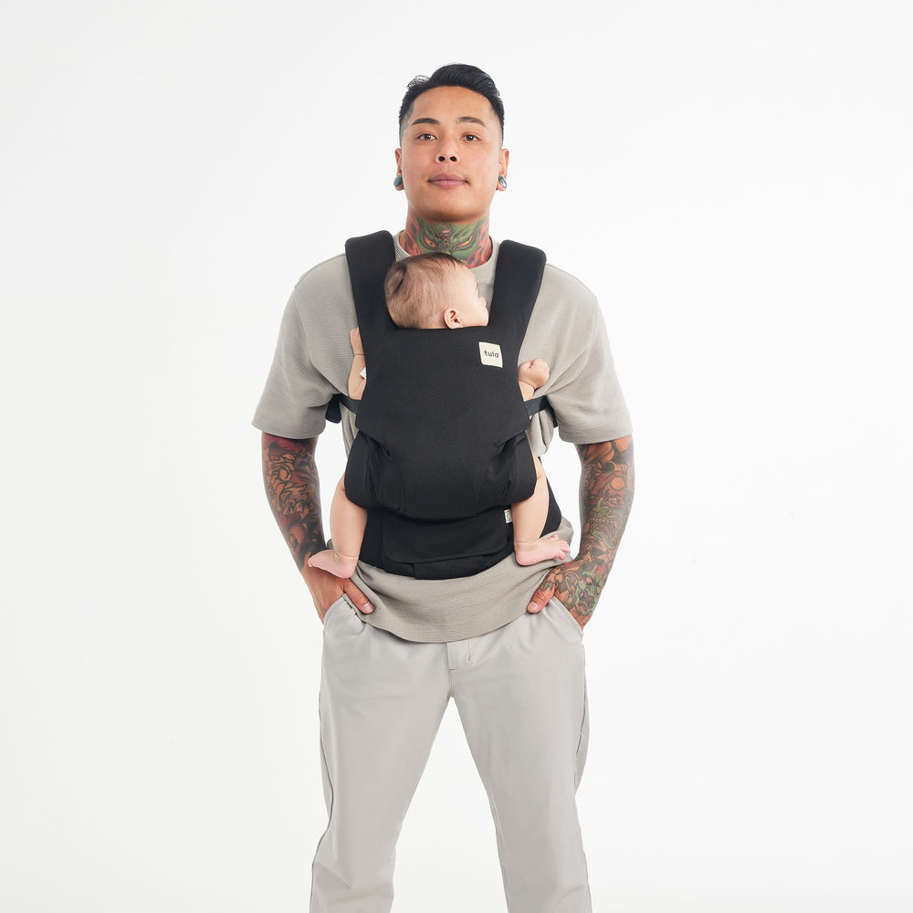 Tula Explore Mesh Urbanista removable hood demonstrates sun protection on the go.