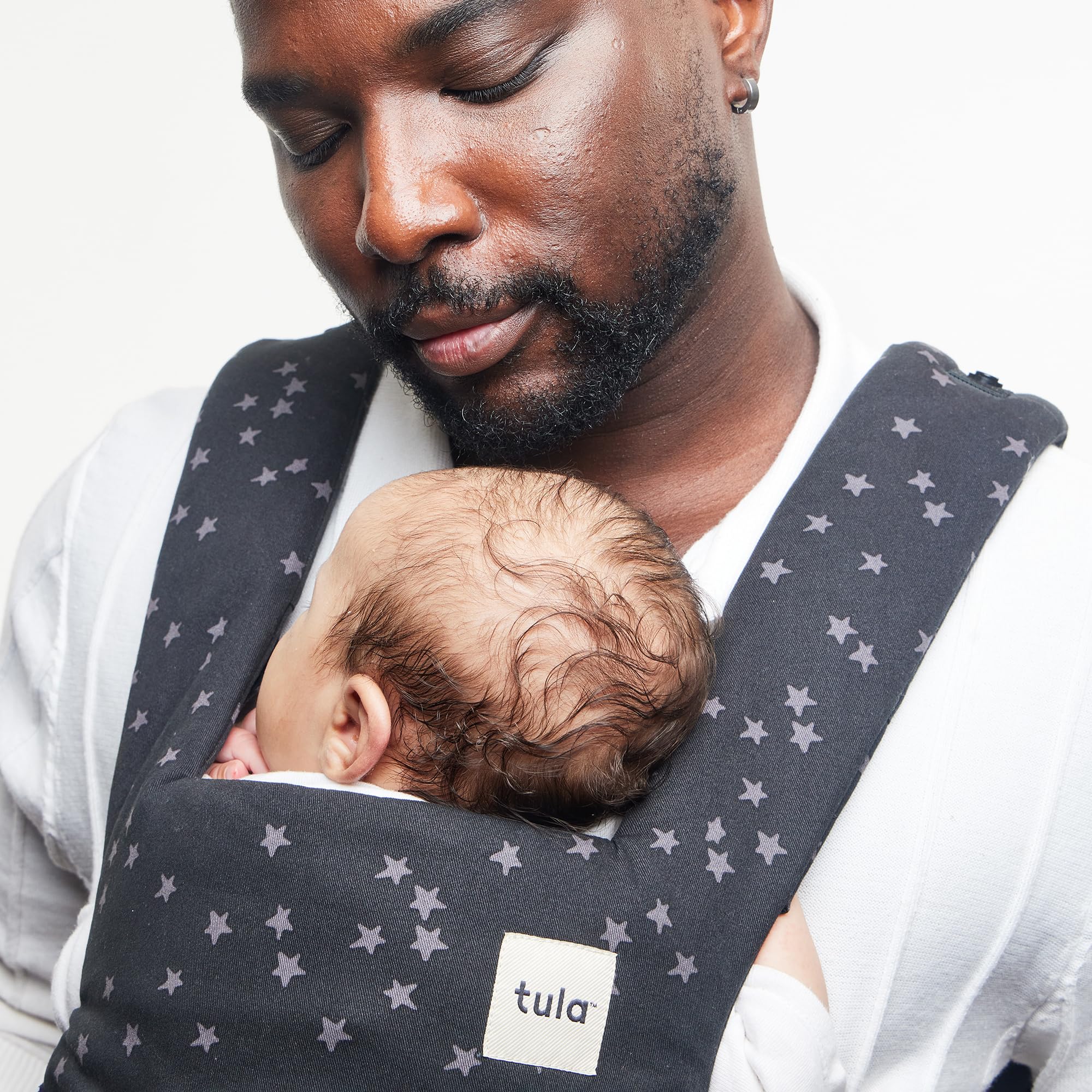 Tula Explore removable hood provides sun shade and privacy on the go.
