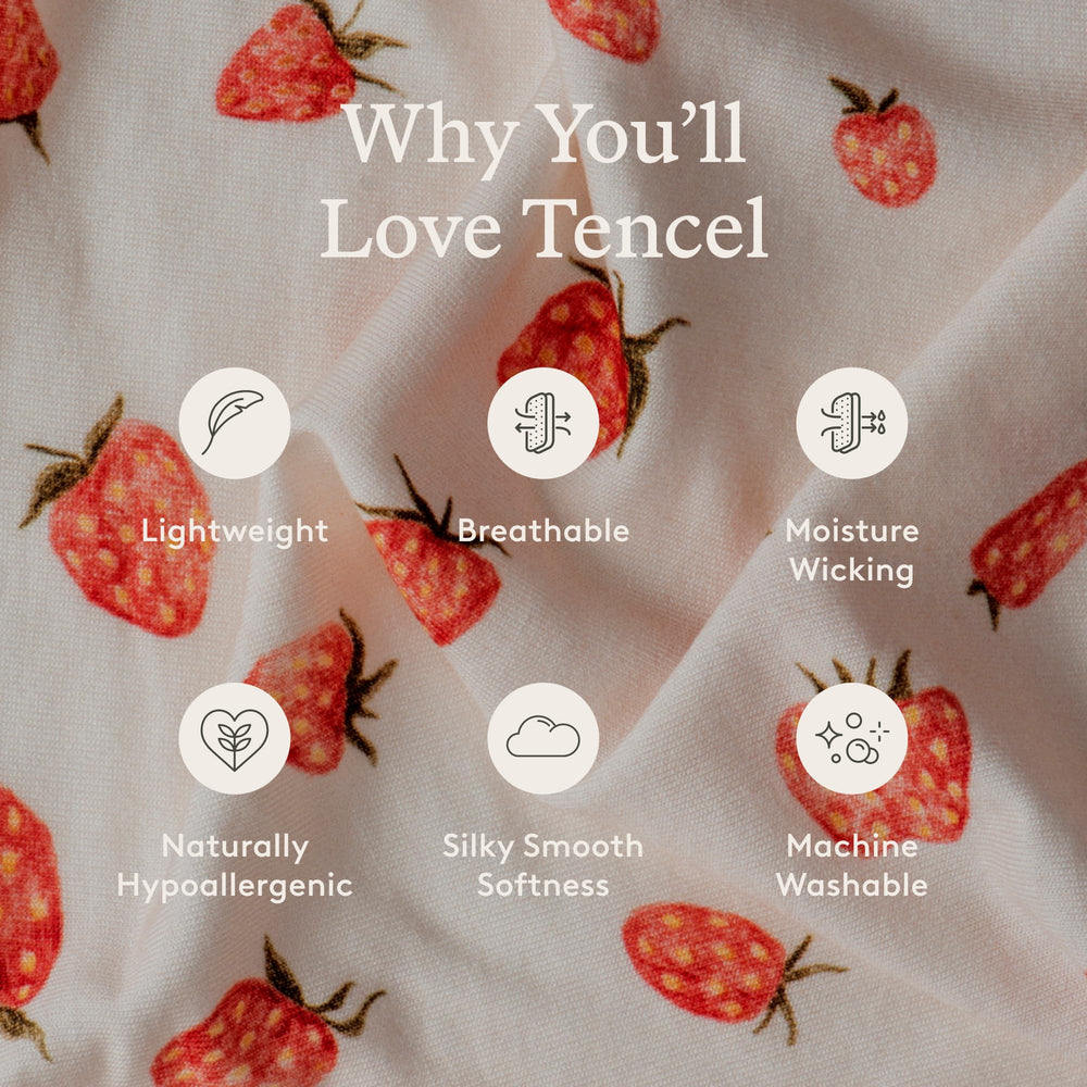 Tula Stretchy Tencel wrap image emphasizes breastfeeding-friendly positioning