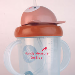 TUM TUM Tippy Up valveless free-flow cup suitable for relaxed sipping.