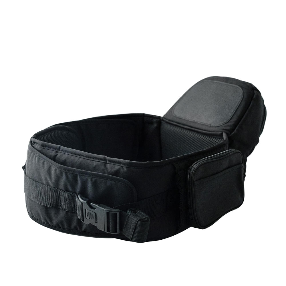 TushBaby carrier with extender in use demonstrates comfortable, all-day wear for caregivers