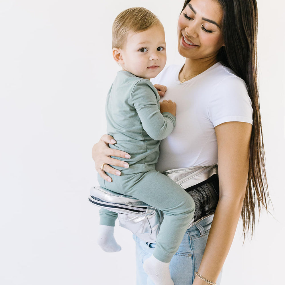 TushBaby adjustable waistband with extender to fit growing waists securely.