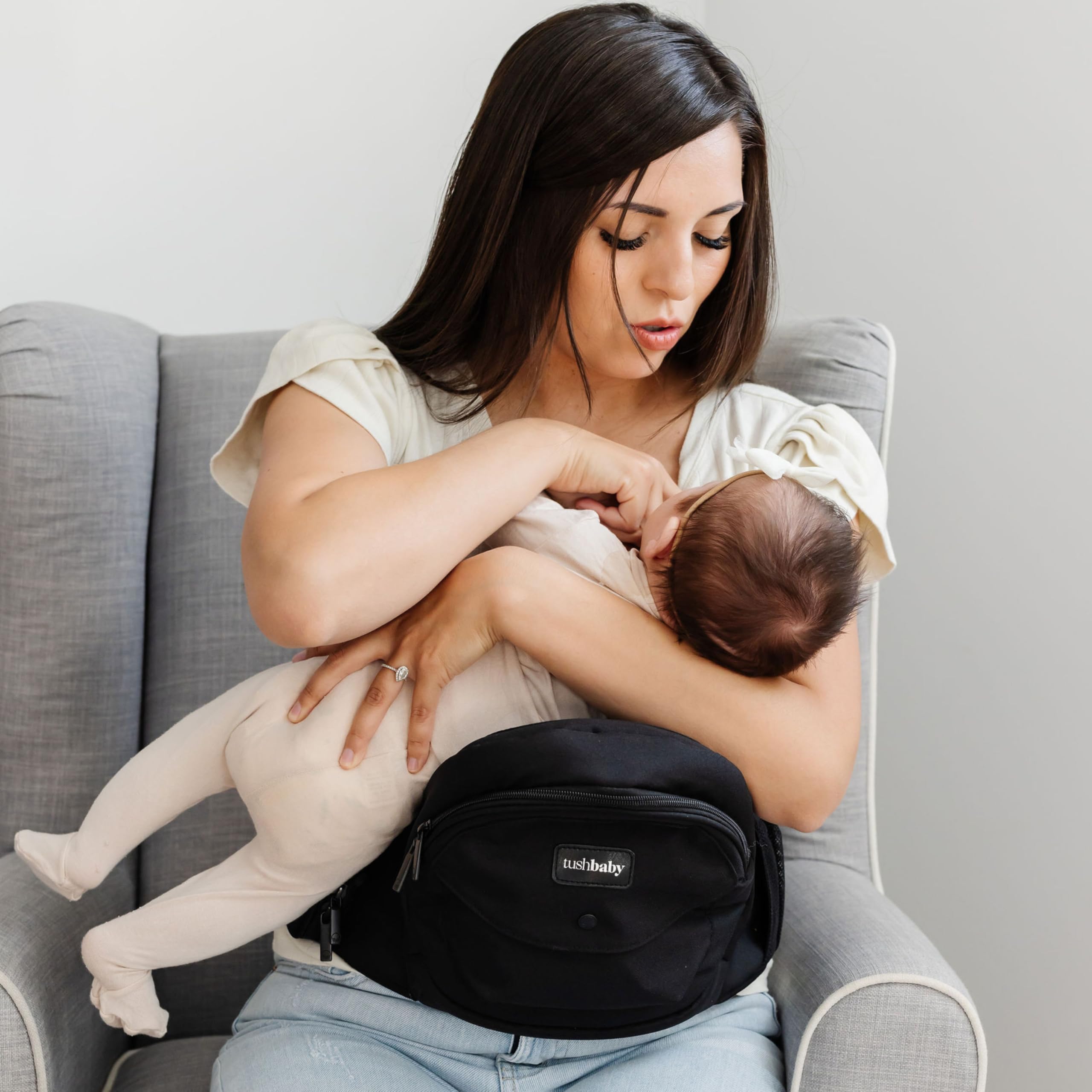 TushBaby nursing pillow feature facilitates comfortable feeding on the go.