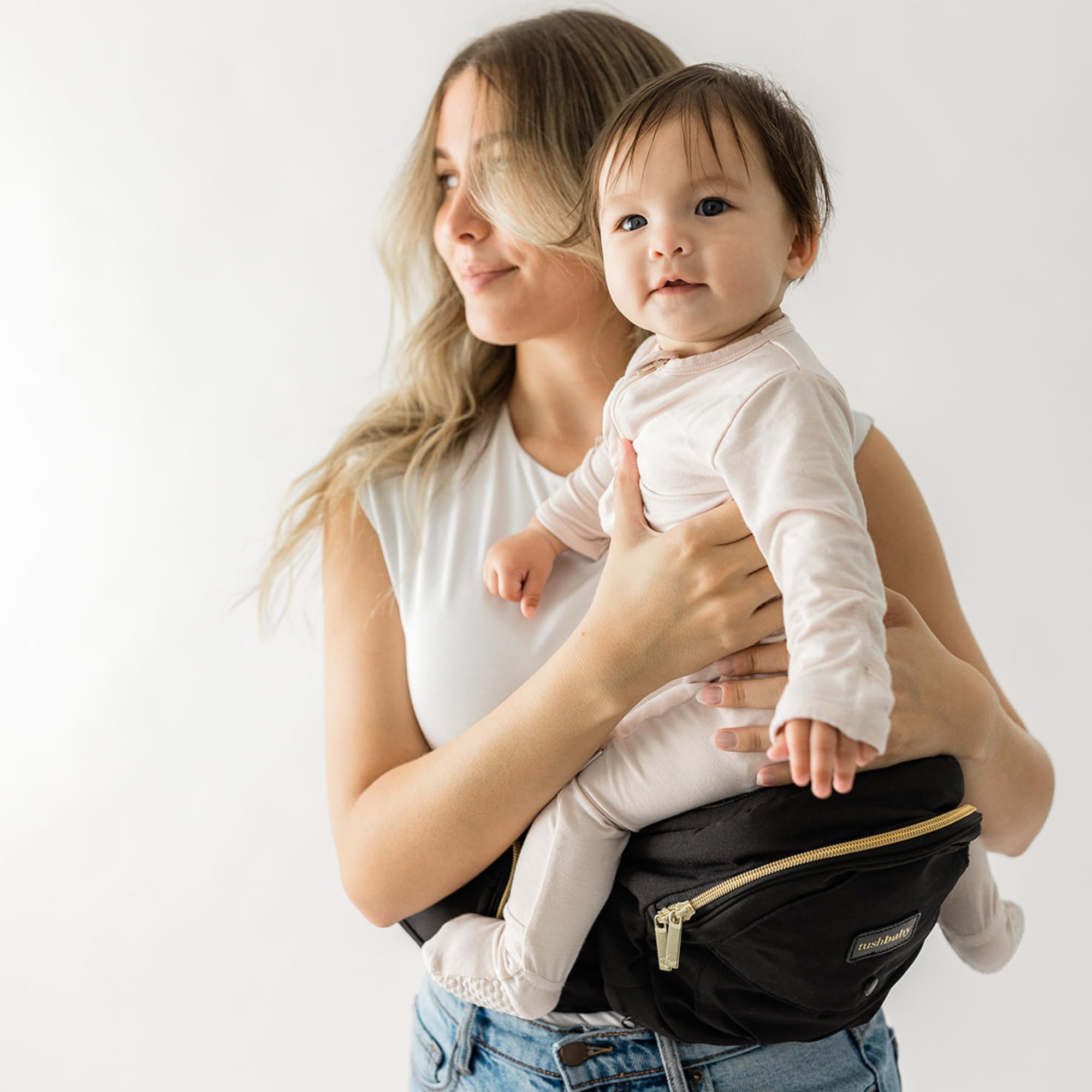 TushBaby original hip-seat buckle closeup shows secure safety buckles for confident carrying.