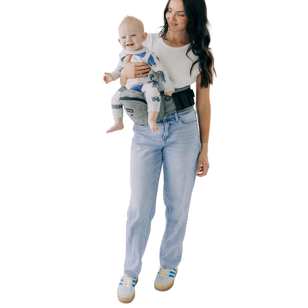 TushBaby Original hip seat with built-in storage pockets.
