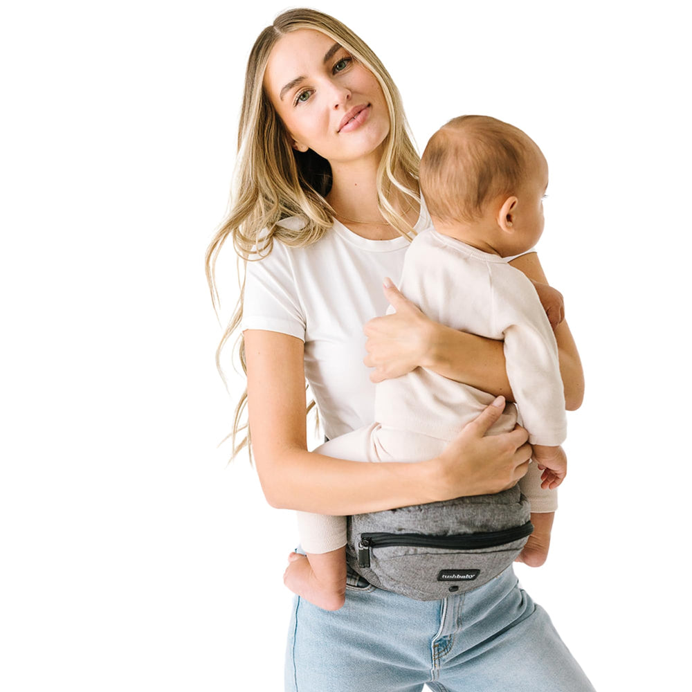TushBaby Original hip seat in face-to-face carry for bonding.