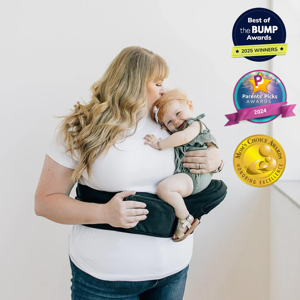 TushBaby side carry provides snug, hands-free support on errands.