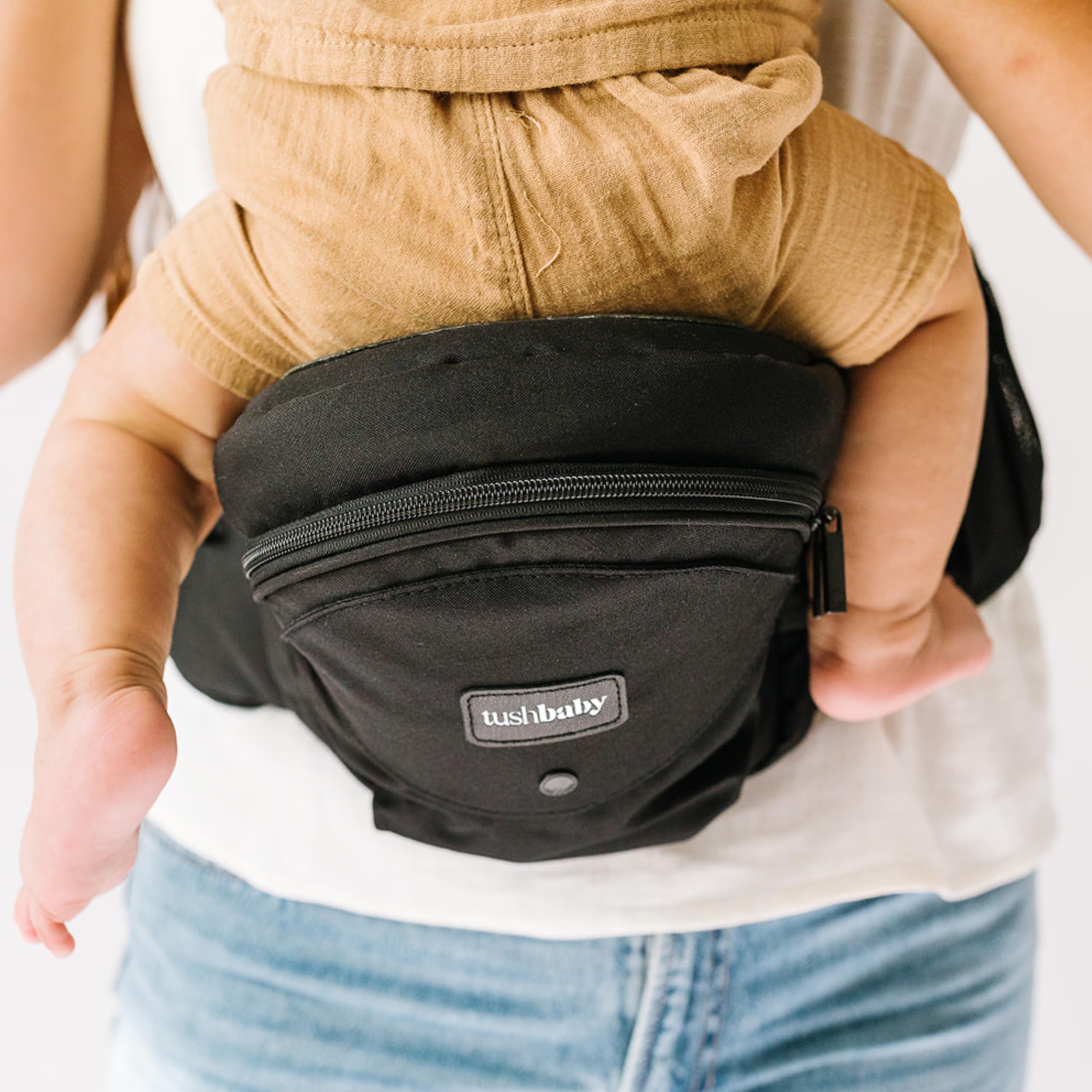 TushBaby storage pockets keep essentials within reach during daily routines.