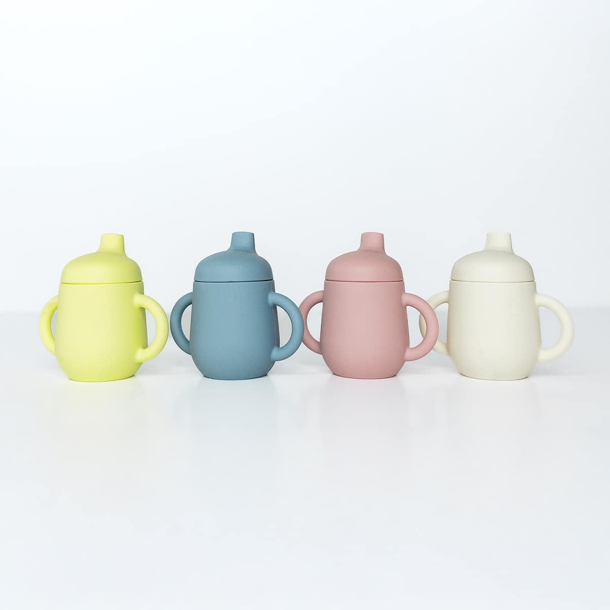 TushBaby Training Cup fits in a diaper bag or car cup holder for on-the-go hydration.