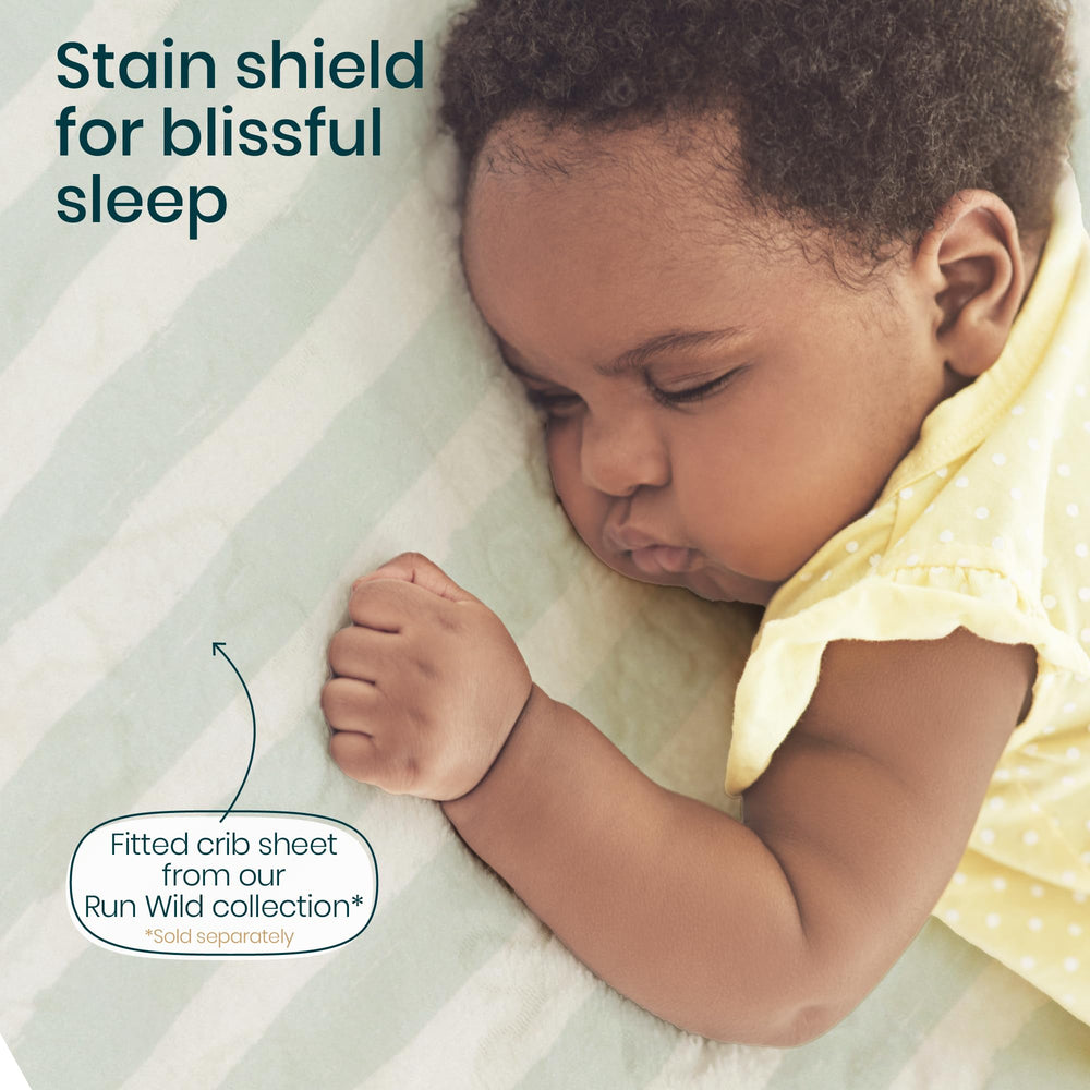 Tutti Bambini perfect-fit protector guards against spills and stains on bassinet mattress.