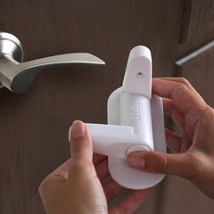 Tuut lever lock-buttons-press detail highlights patent-enabled operation for adults.