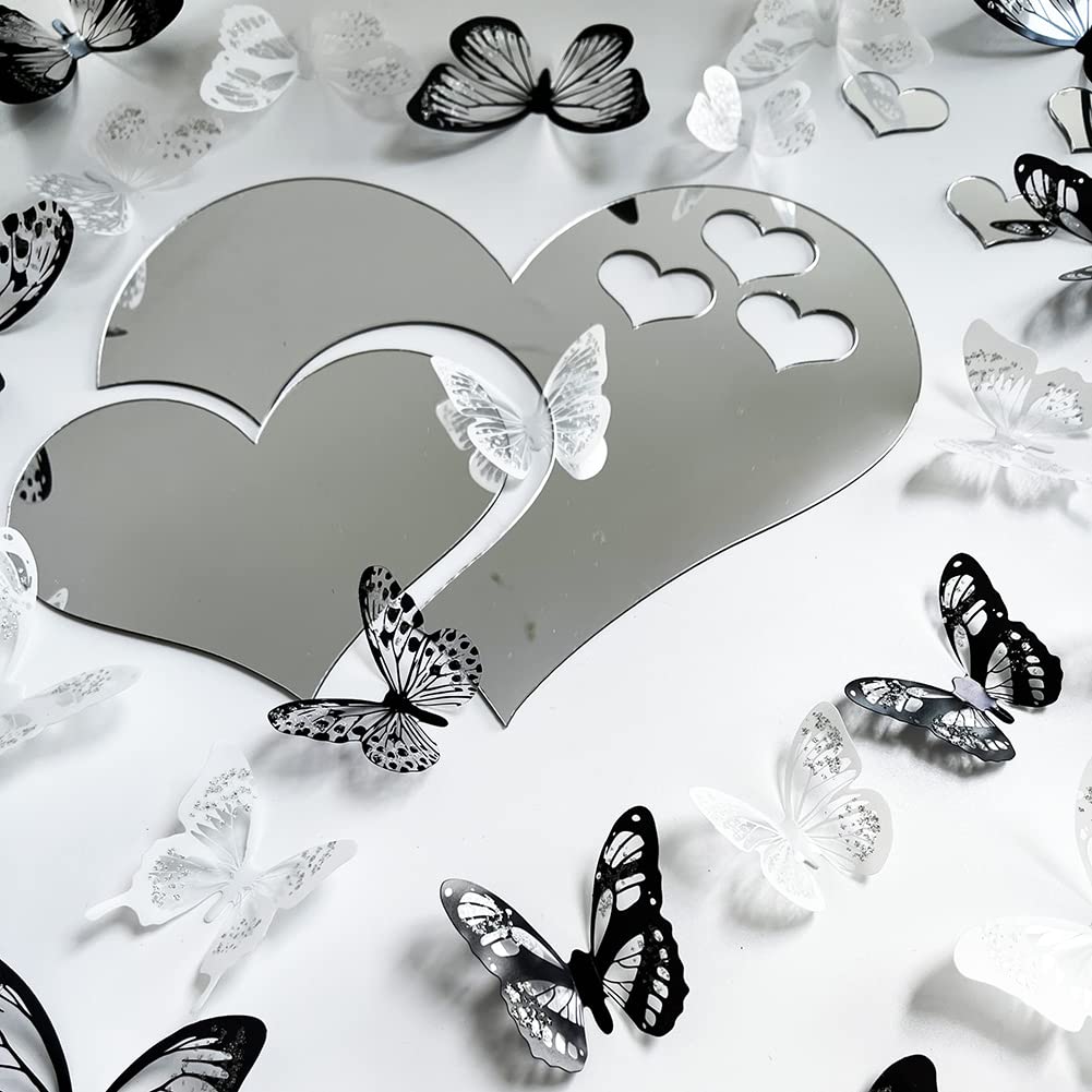 TVPHLLY acrylic mirror hearts reflecting light for elegant decor.