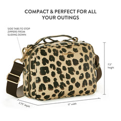 TWELVElittle Luxe Diaper Clutch detachable crossbody strap enables hands-free wear.
