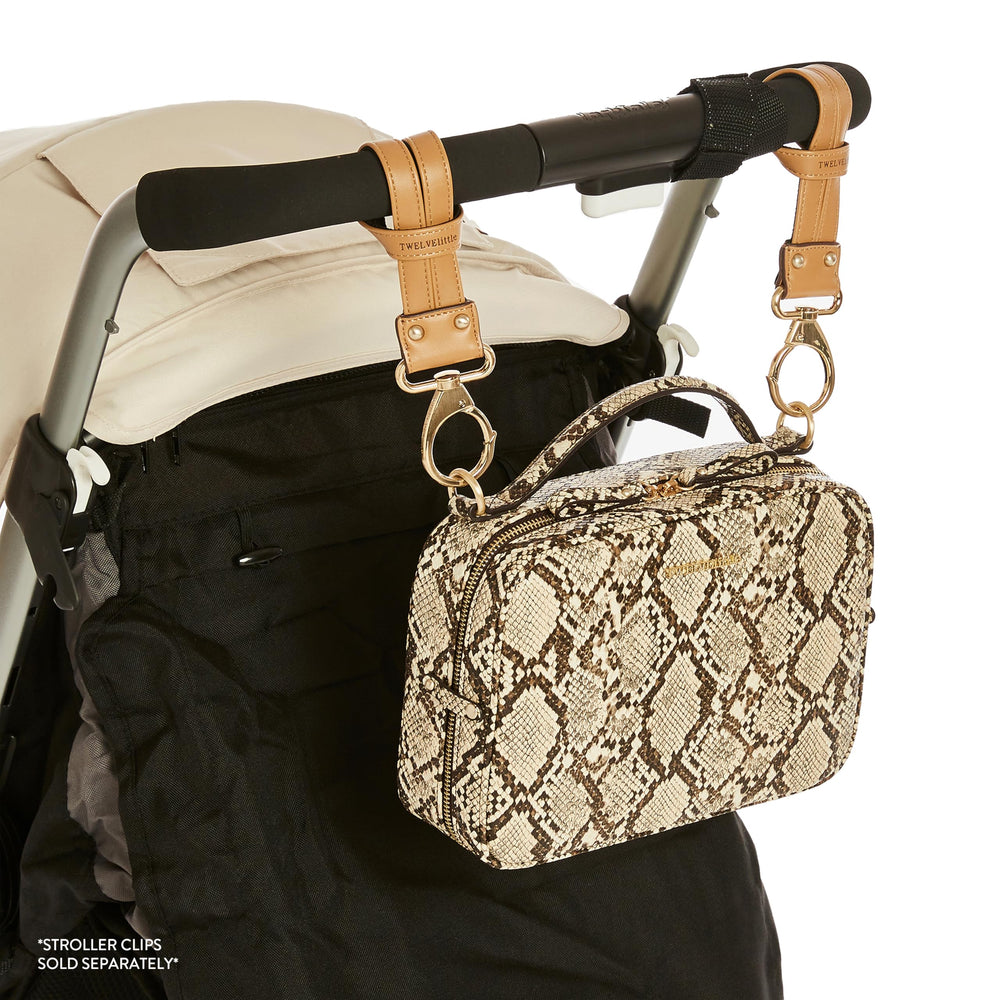 TWELVElittle Luxe Diaper Clutch water-resistant lining protects essentials.
