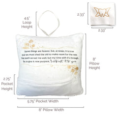 Twenty Moments of Tooth pillow pocket demonstrating secure tooth storage.