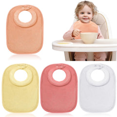Twistover white padded-collar bib keeps baby dry during feeding