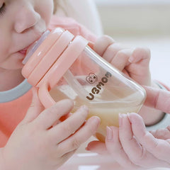 UBMOM No-Spill Sippy Cup converts to baby bottle by removing anti-leak disk for versatility.