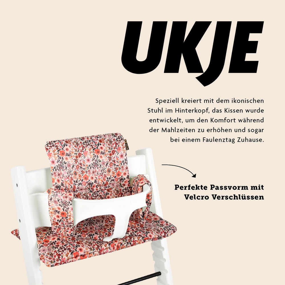UKJE cushion pink-flowers side view, enhances toddler dining comfort.