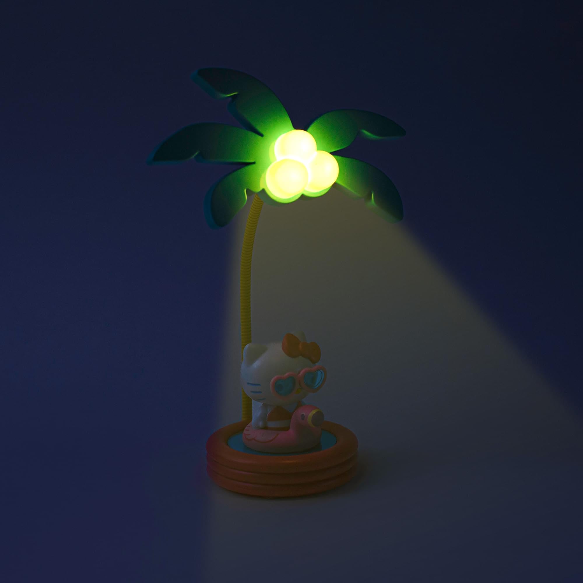 Ukonic Sanrio Hello Kitty pink flamingo floatie scene mood lighting