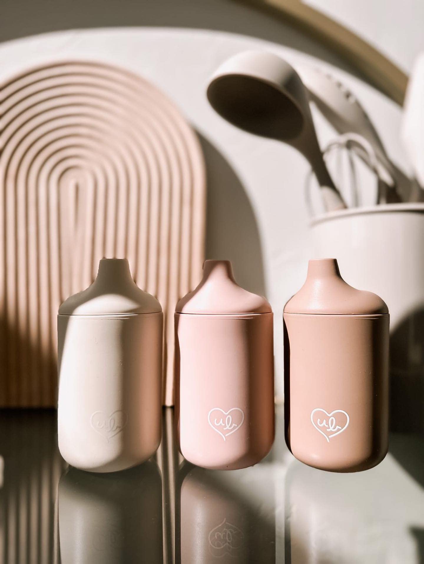 Ullabelle spill-proof cups ideal for travel and daycare routines.