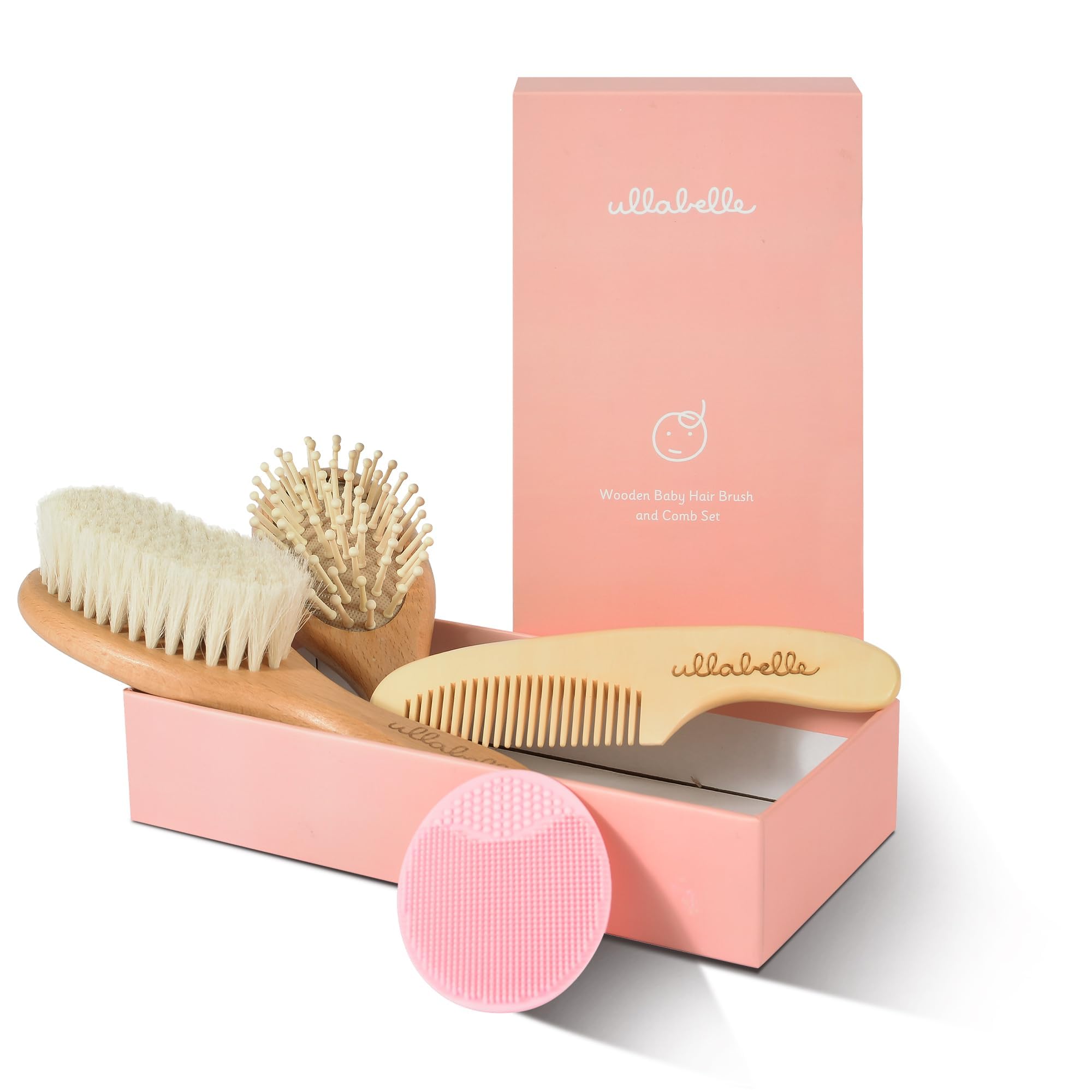 Ullabelle pink gift packaging shows a premium newborn hair care kit for registry gifts