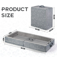 Umoving portable toddler travel bed open with integrated rails for safe sleep.