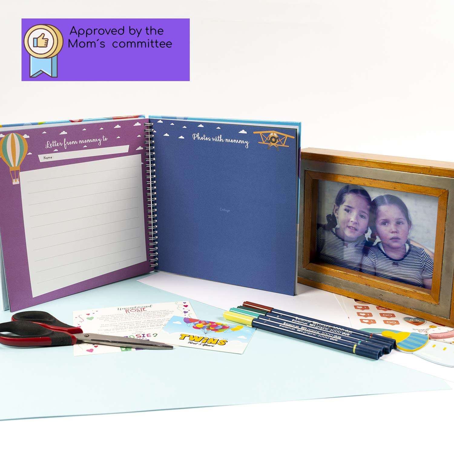 Unconditional ROSIE memory book with thick pages for busy family moments.