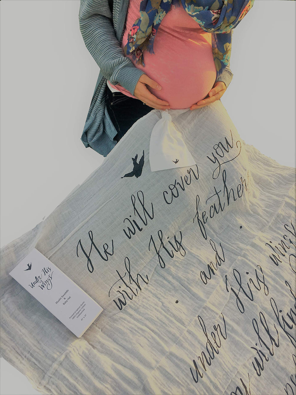 Under His Wings baby swaddle used as stroller cover or photo prop