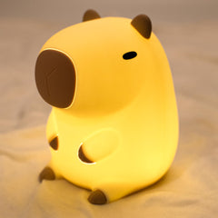 UNEEDE cute capybara night light on table emits a warm 3000K glow.