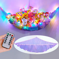 Unicorn Castle net hammock with LED light closeup showing organized plush storage and glow