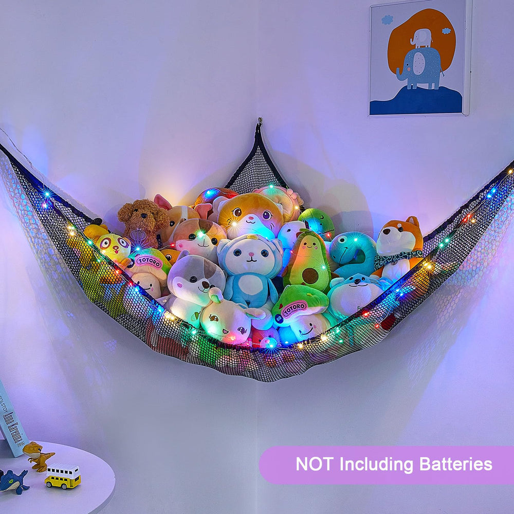 Unicorn Castle stuffed animals net hammock featuring LED light strip for ambient playroom mood.