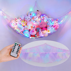 Unicorn Castle net hammock installed in a nursery helps store plush toys neatly.