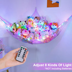 Unicorn Castle rainbow net organizer adds playful storage to kids' room.